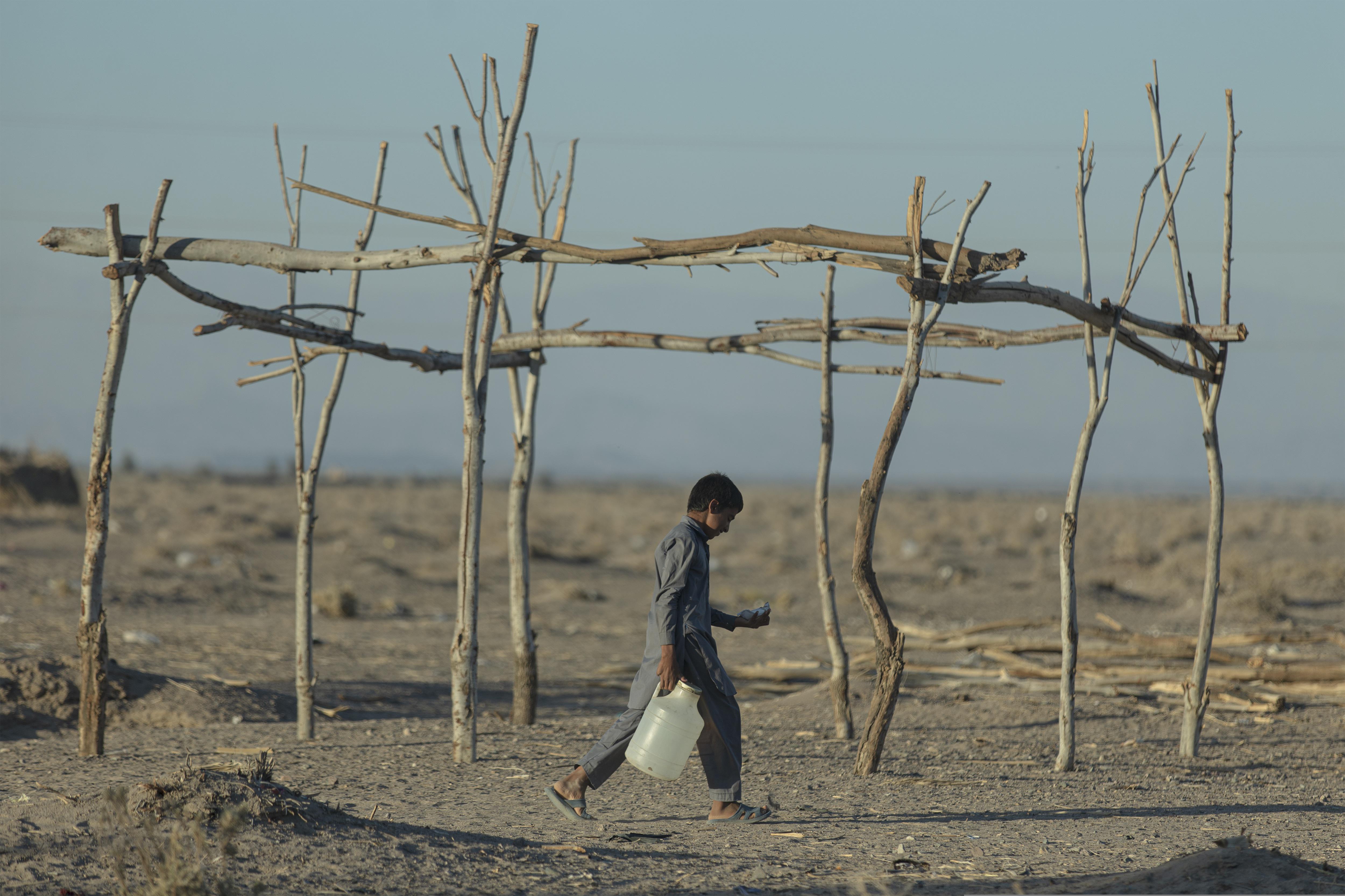 Baloch kid with water