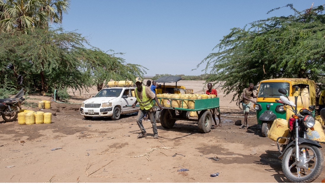 Water vendor leaving to deliver water to his customers in Kalokol town