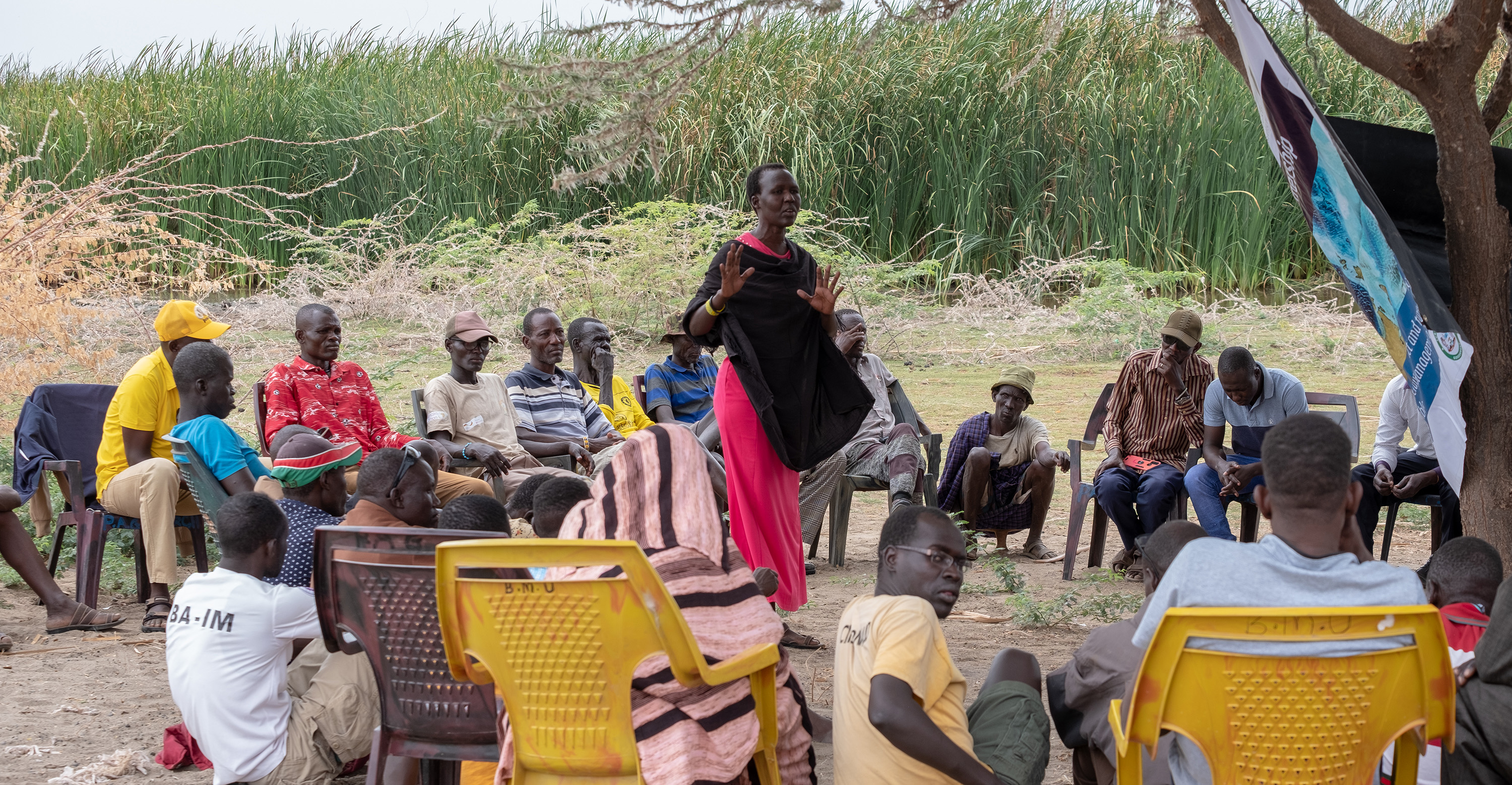 A lady fish wholesaler addressing the meeting