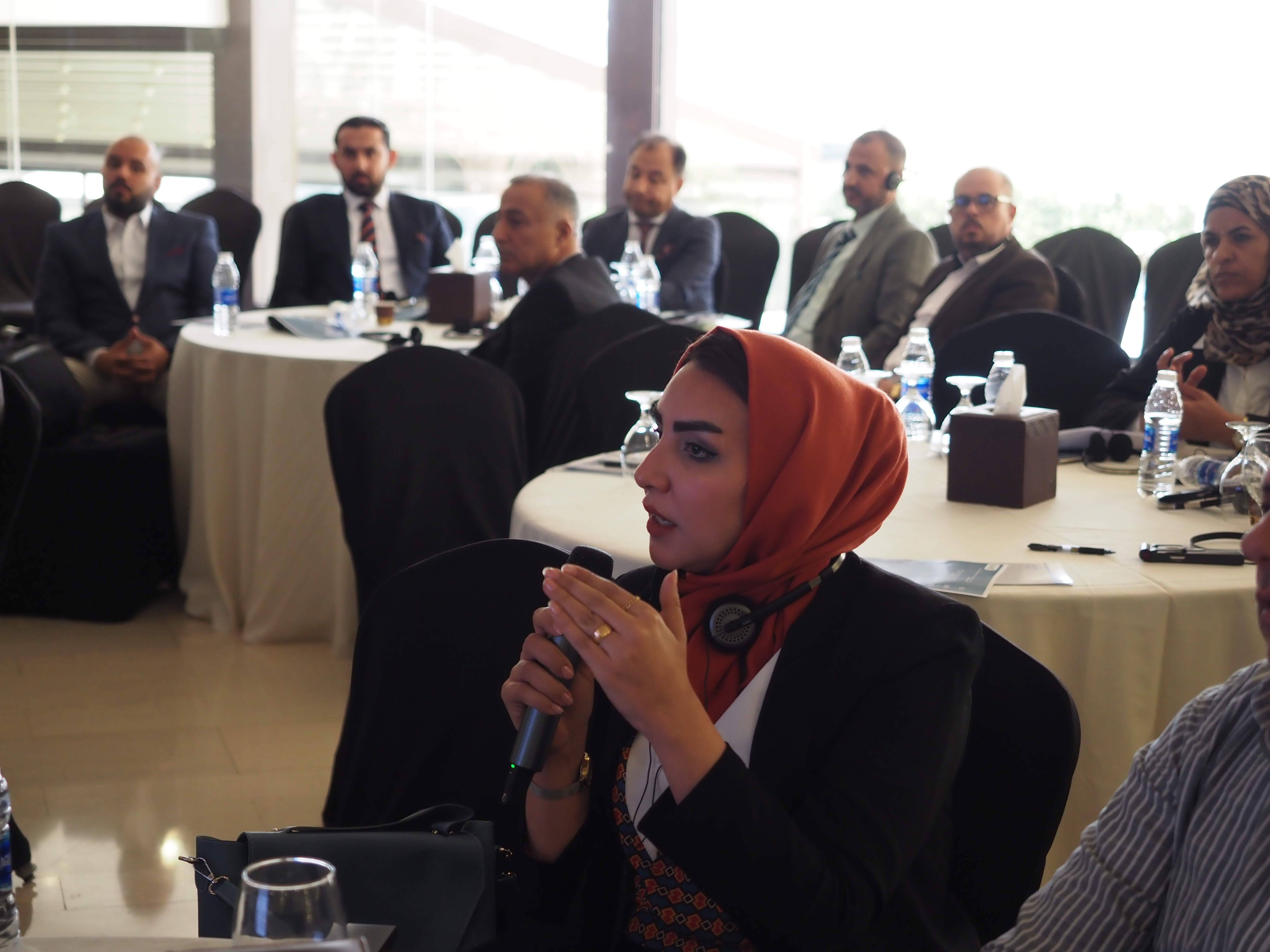 Female participant addresses the WPS Symposium